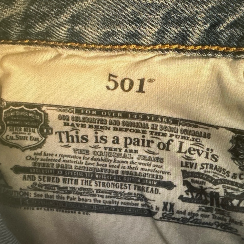 Levi's Light Wash Frayed Hem Denim Shorts - Picture 4 of 8